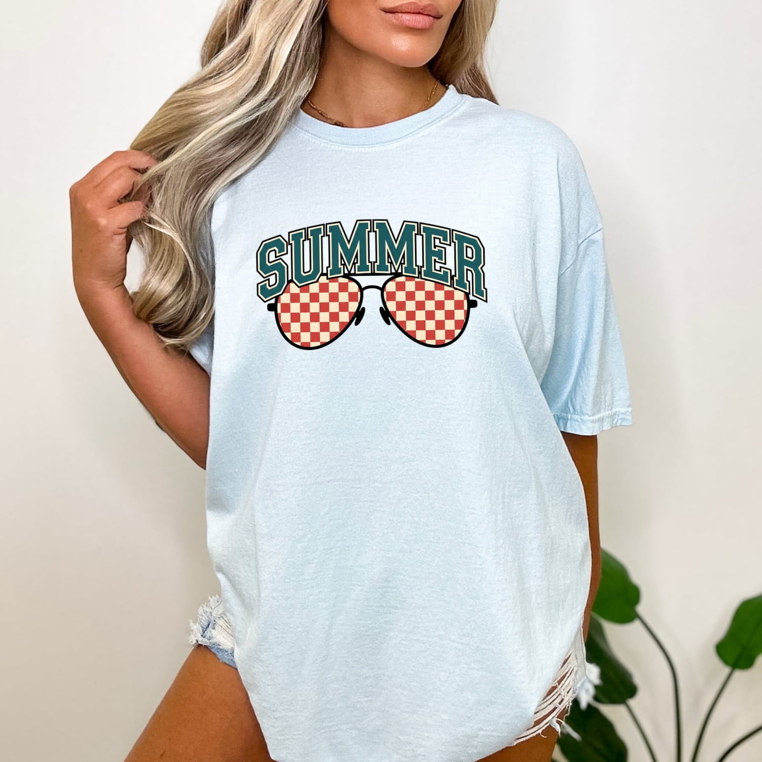 Chambray colored Comfort Colors 1717 t-shirt with 'Summer' and sunglasses graphic worn by a woman.