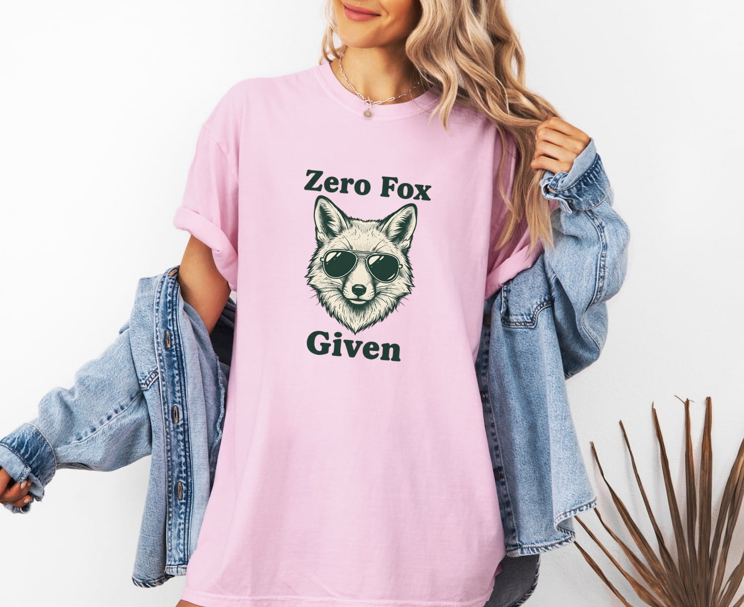 Woman wearing a blossom Comfort Colors 1717 t-shirt with a fox graphic and sarcastic text, standing against a white background.