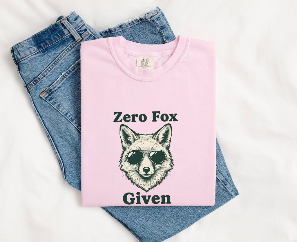Blossom Comfort Colors 1717 t-shirt with fox graphic and sarcastic text, folded on jeans